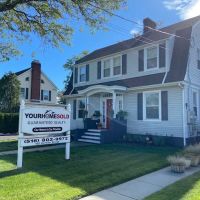 Your Home Sold Guaranteed Realty - The Real McCoy Team ico