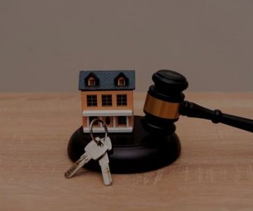 The Pros and Cons of Buying a Foreclosed Home Explained